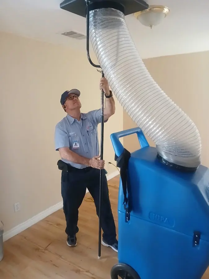 Furnace Tune-Up technician using HEPA equipment in Eucalyptus Hills